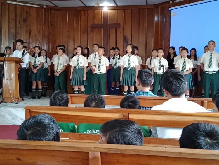 STUDENTS PRESENTING A SONG